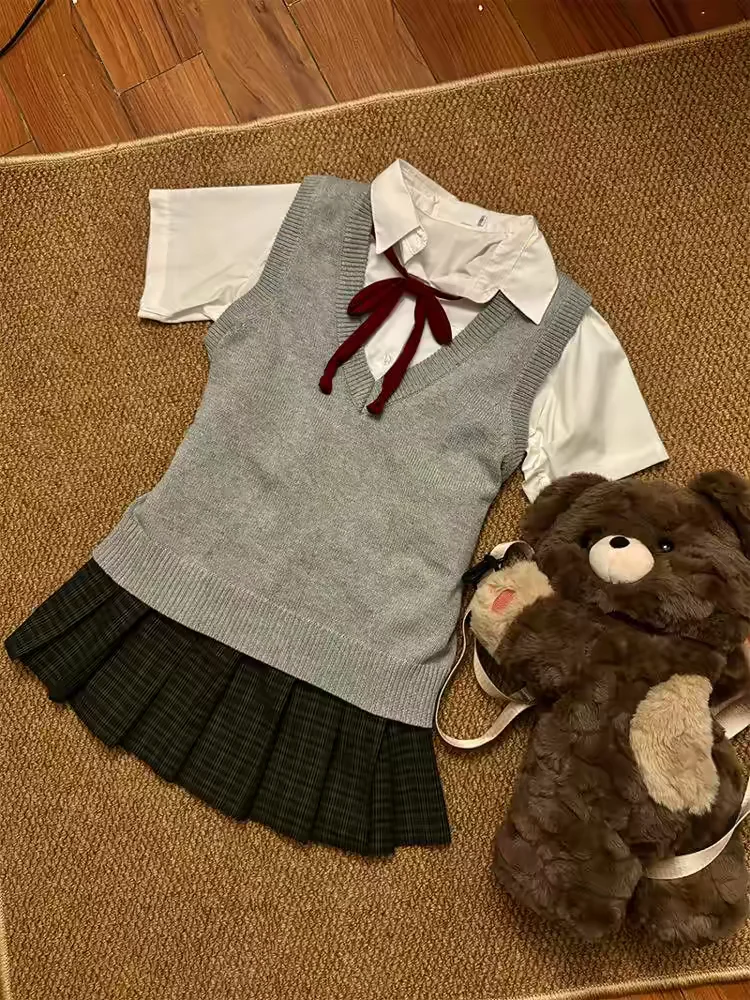 

Осенняя коллекция: Нежная однотонная плиссированная юбка с V-образным вырезом для женщин, базовая модель в стиле японской школьной формы JK, для многослойных образов.