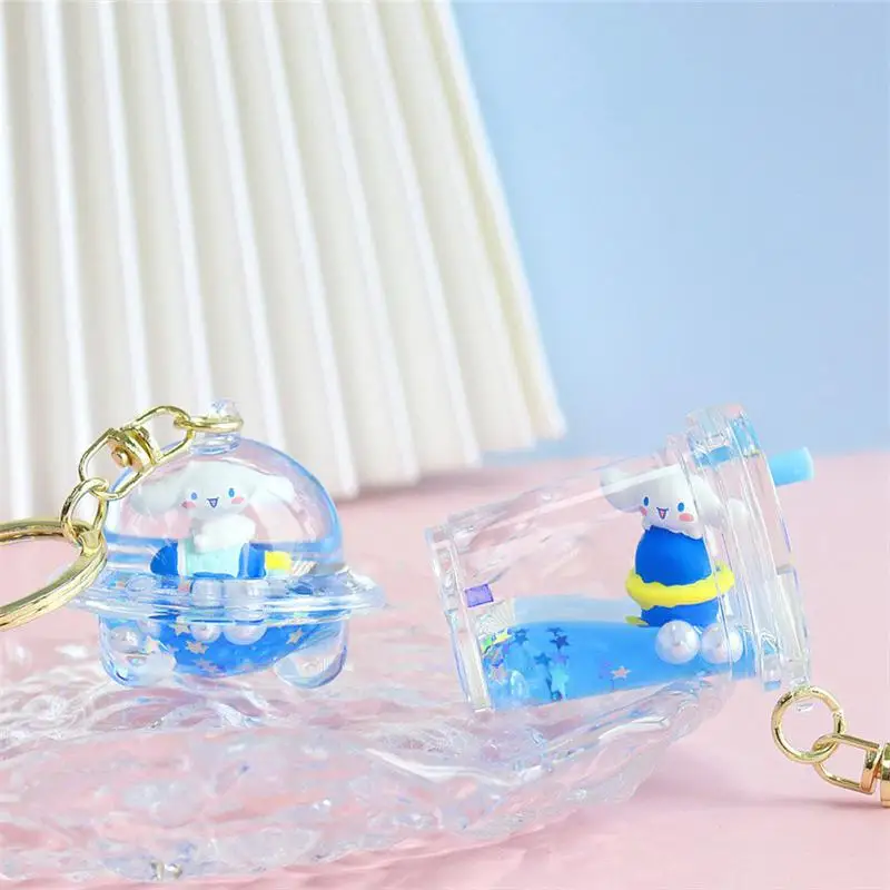 Sanrio อะนิเมะรูปเด็ก Cinnamoroll Key Chain รอบตุ๊กตาการ์ตูน Kawaii เป็นน้ำมันลอยขวดของขวัญจี้สำหรับหญิง