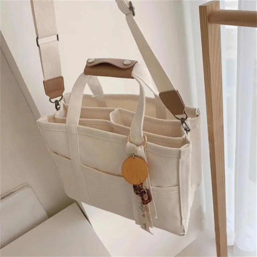 Damesmode canvas handtassen babyverzorging luiertassen moeder schoudertas grote capaciteit zuigfles opslag mummie crossbody tas