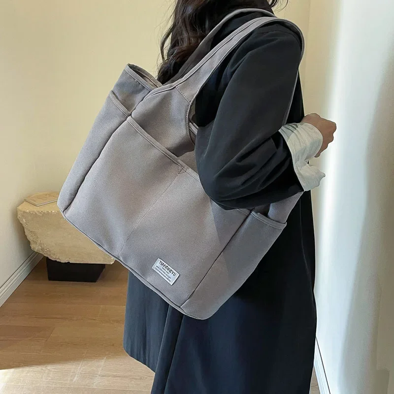 

Simple and Versatile Korean Version Solid Color Hand-held Sail Bag, Woven Large Capacity Shoulder Bags, Suitable for Commuting