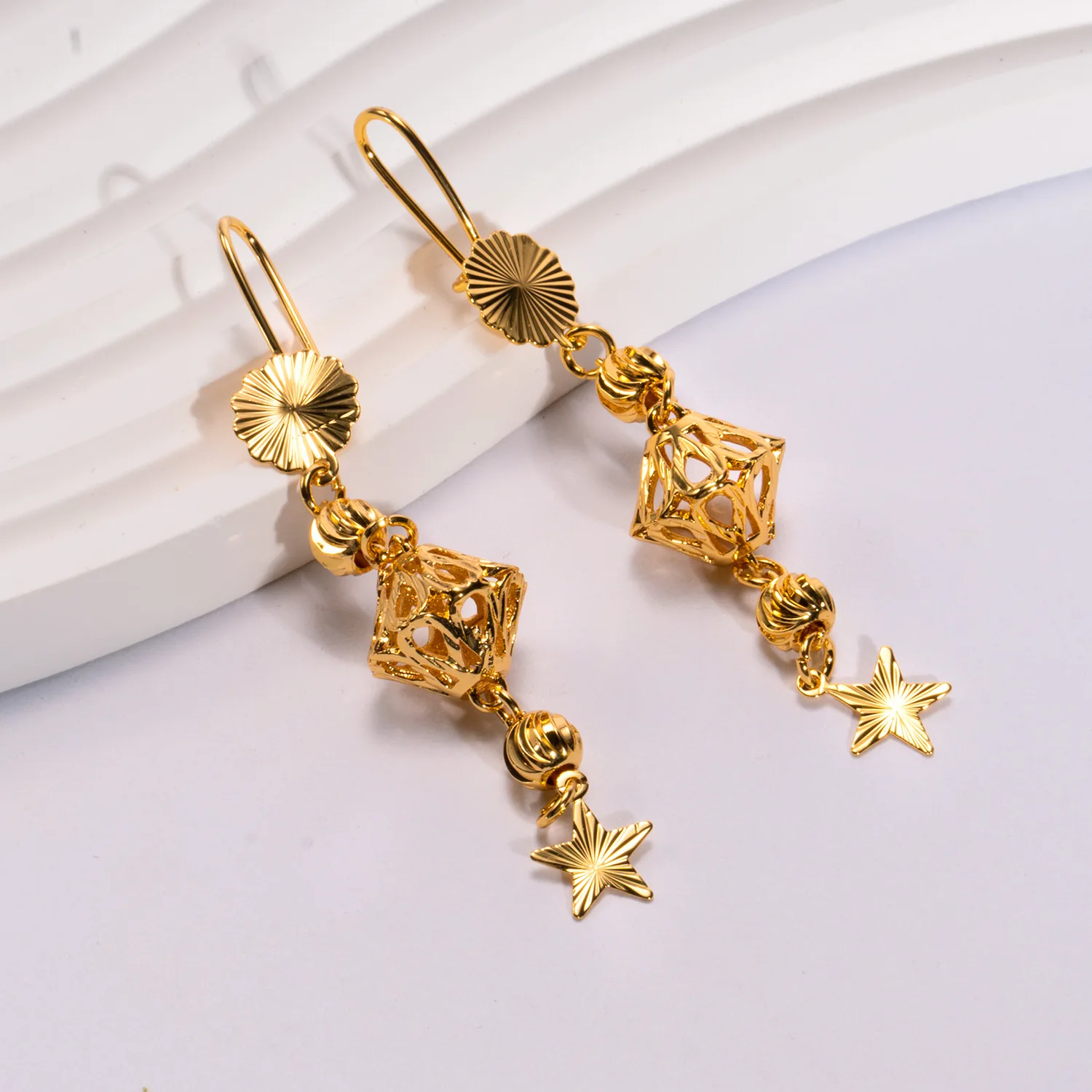 9999 gold Bohemian high-style earrings with bridal fringed drop earrings, showcasing ethnic style.