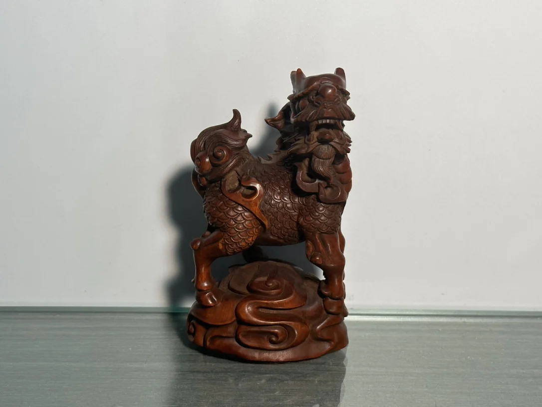 

Chinese wood carving boxwood carving precision carving Rui beast Qilin home decoration