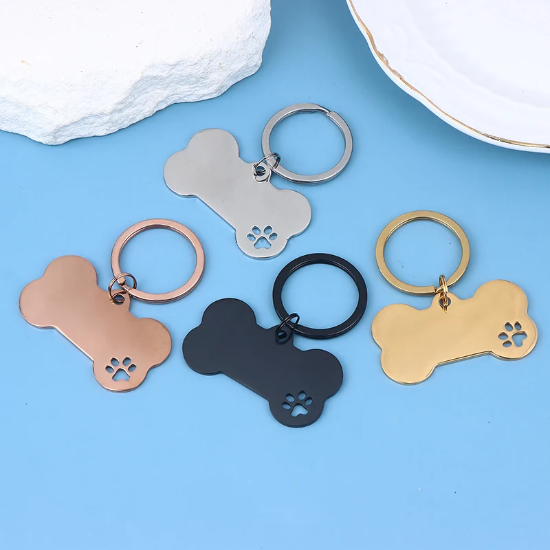New Hot Sale  Abstract Dog Footprint Keychain Name And Text Tags Cat Dog ID Tag Name With Cute Symbols Bone Shaped Pet Nameplate