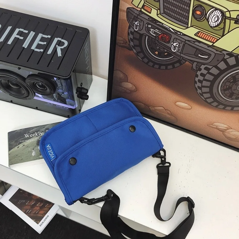 

Multiple Pockets Square Message Bag Large Capacity Korean Style Nylon Crossbody Bag With Pendant Solid Color Men Shoulder Bag