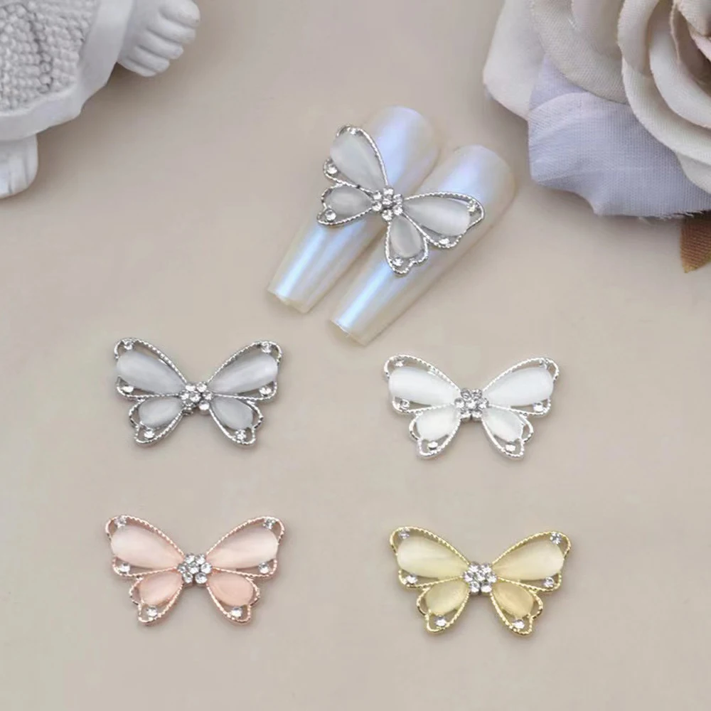 10Pcs Siver White Crystal Butterfly Nail Art Charms 3D Alloy Hollow Cat's Eye Zircon Nail Gems Luxury Butterfly Nail Accessories