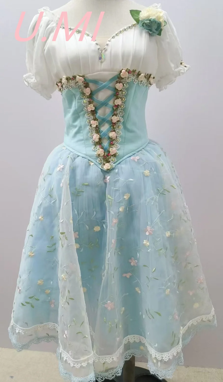 

Giselle's uncaged daughter Clara performs a tutu variation for a long dress