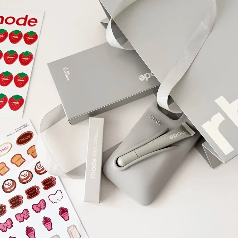 

Trendy Rhode Lipstick Phone Case With Gift Bag For iPhone16E 16 15 14 13 12 11 Pro Max Plus Ribbon Espresso Raspberry Gray Cover