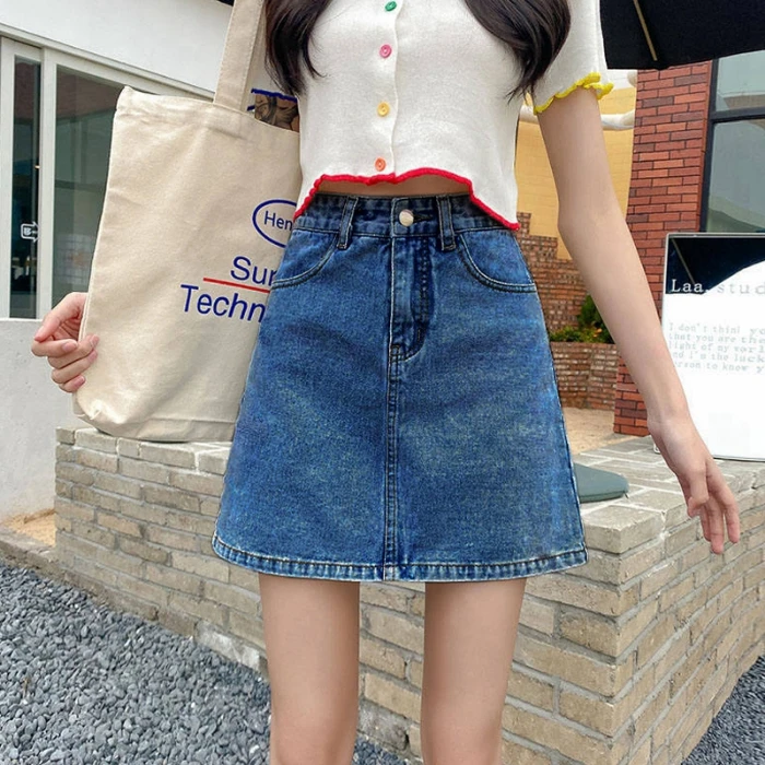 Solid color denim skirt female students Korean version of high-waisted versatile niche package hip a-line half-body short skirt