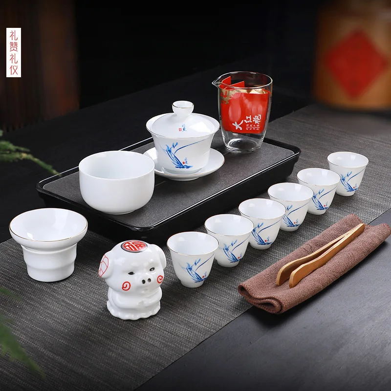 

Porcelain kung fu tea set suit white jade cover teacup customized logo for business gifts