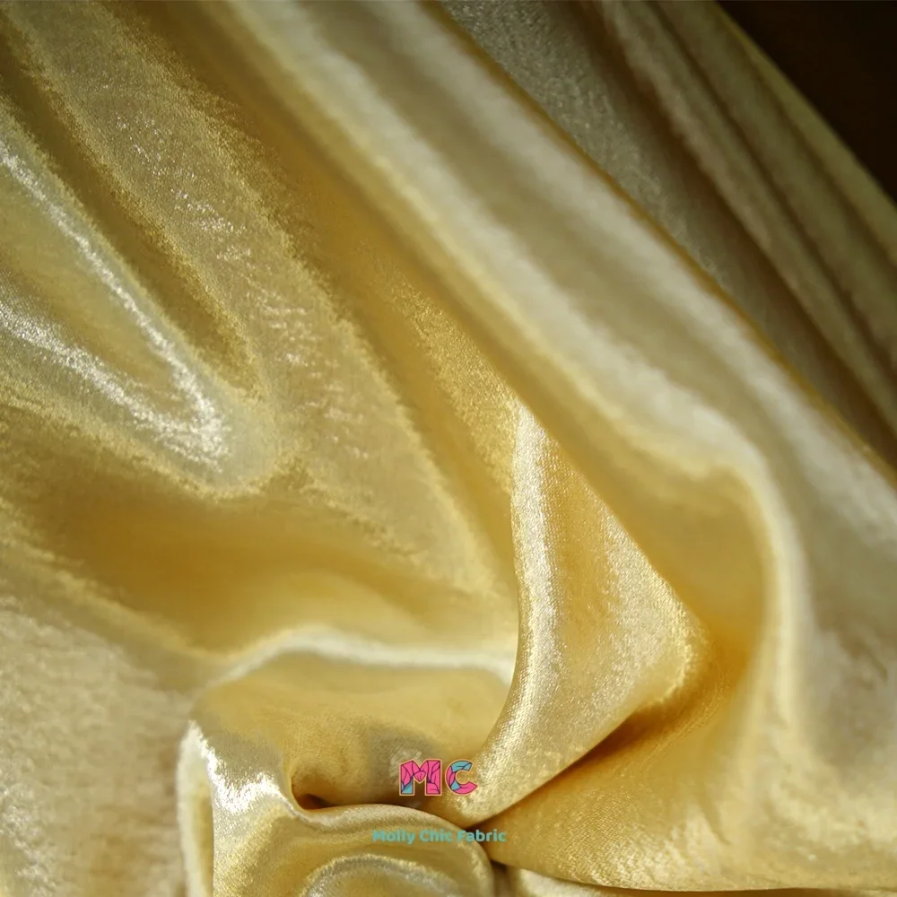 

Golden red shiny crystal double crepe fabric sewn dress stage costume handmade DIY soft drape fabric