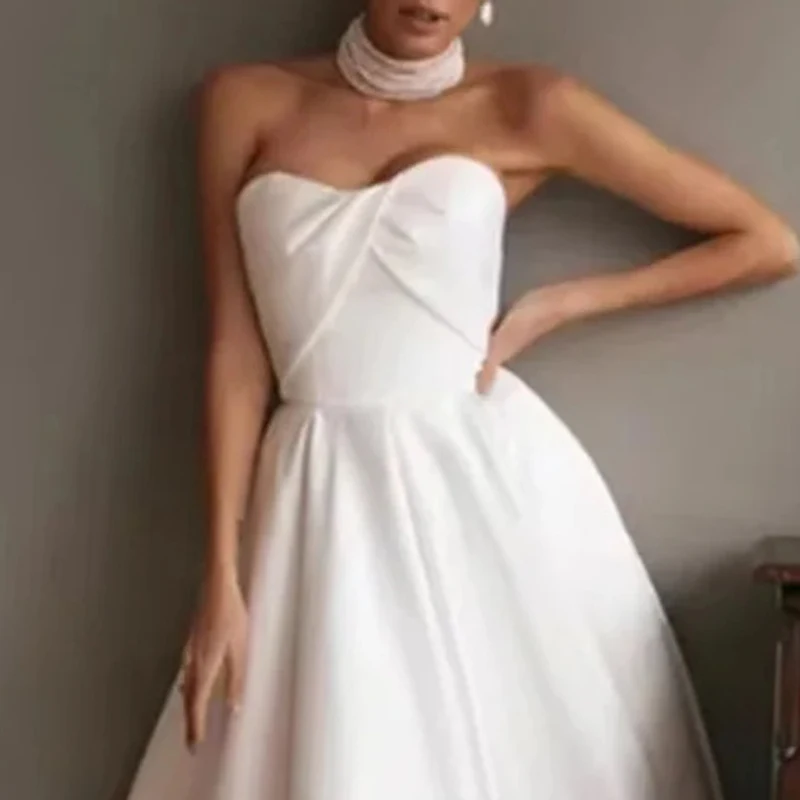 Biała suknia ślubna bez ramiączek dla kobiety, satynowa suknia wieczorowa w kształcie litery A, bez rękawów, elegancka sukienka na przyjęcie o długości do herbaty, szyta na miarę.