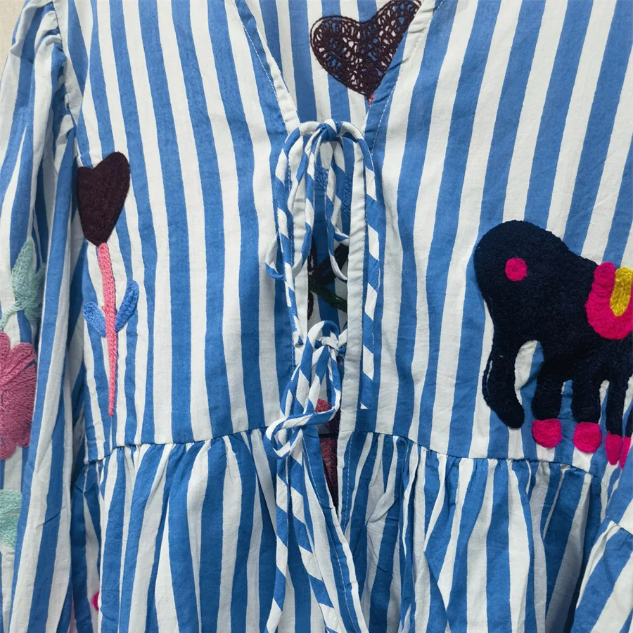 เสื้อเชิ้ตหลวมลายทางสีฟ้าของผู้หญิงแขนยาวผูกแฟชั่นเสื้อลําลอง