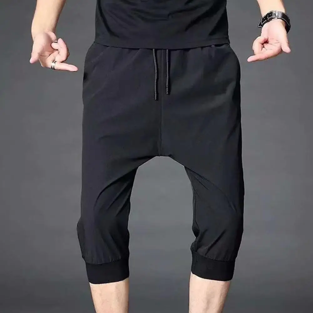 

Stylish Men Cropped Pants Pockets Simple Mid Waist Ankle-banded Stretchy Waist Cropped Trousers