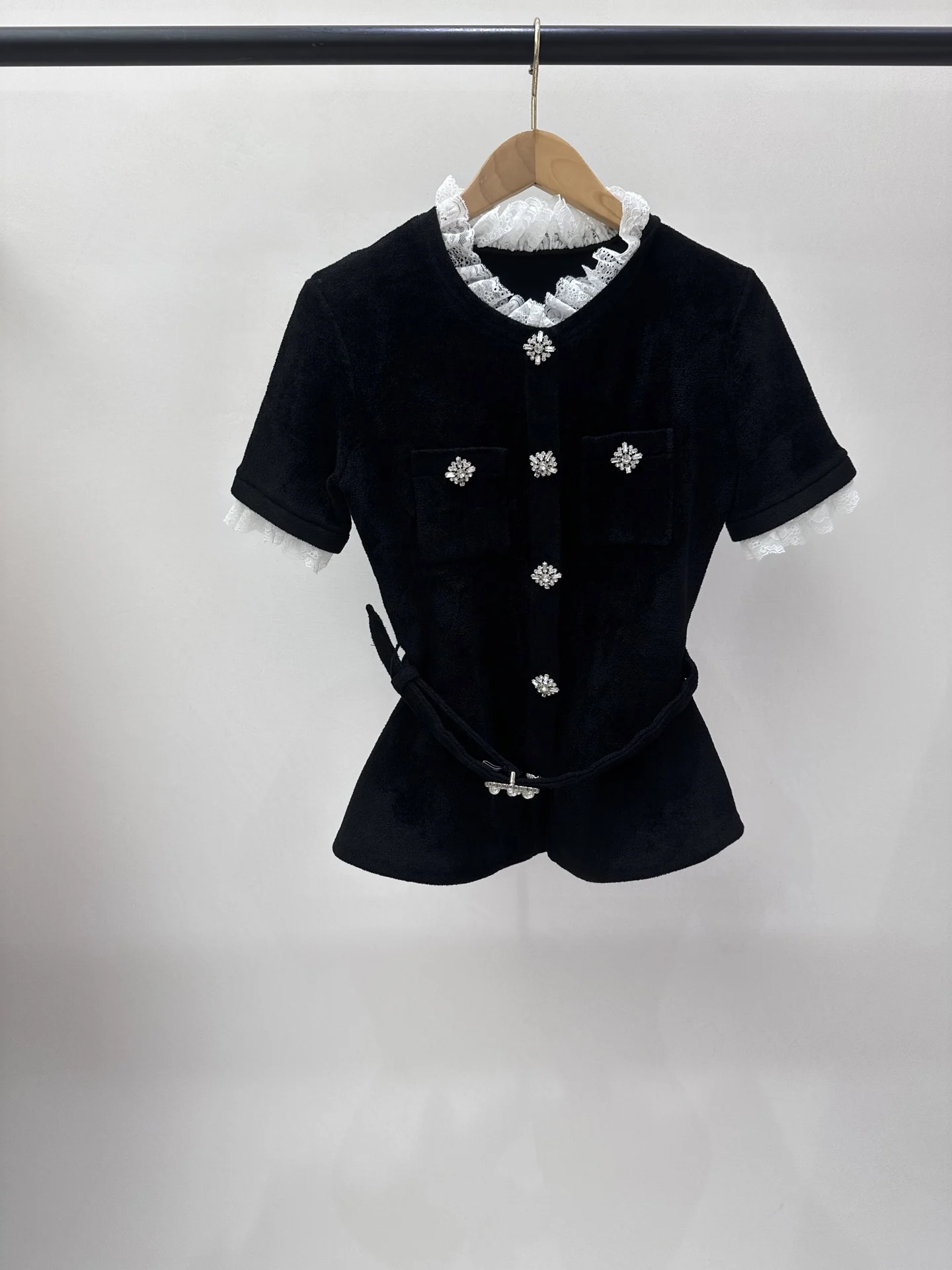 

Lace-trimmed stand-up collar short-sleeve knit top with elegant belted silhouette Black velvet women's knit sweater