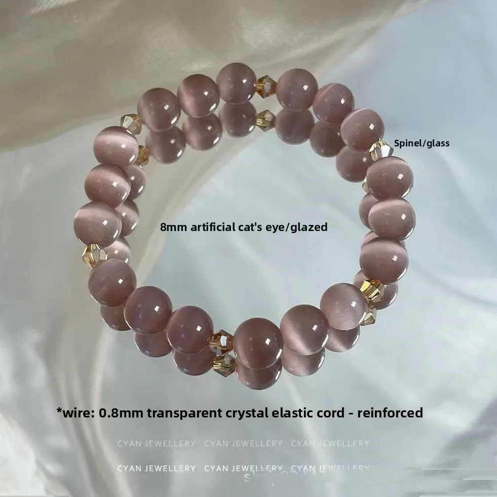 pulseira-de-cristal-elegante-e-versatil-em-ouro-rosa-com-pedra-olho-de-gato-roxa-e-cristal-pontiagudo