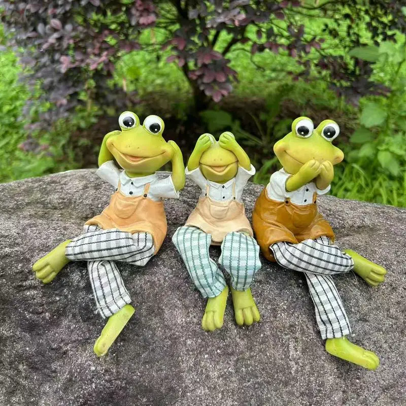 لا تستمع، لا تبدو، لا تتحدث زخرفة الضفدع