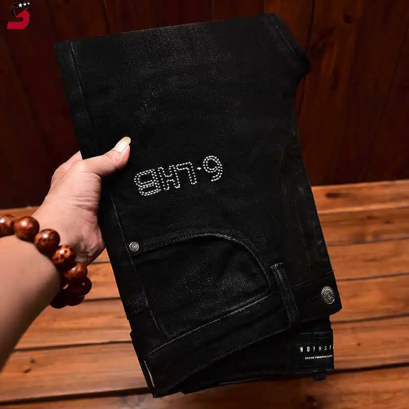 High end American jeans men's embroidered print black small foot elastic slim fit fashionable autumn trend pants