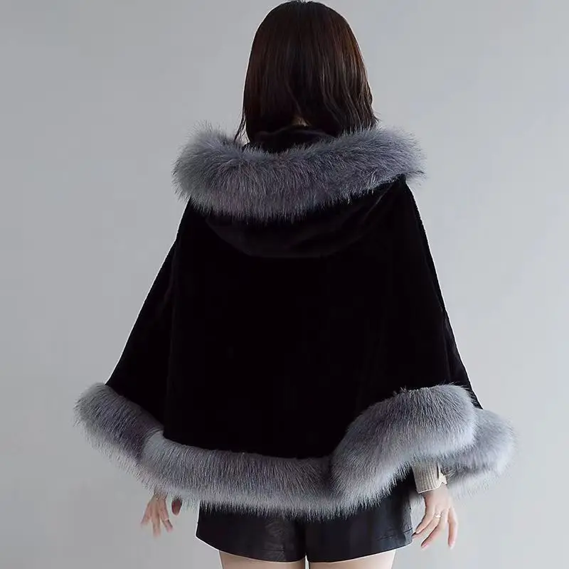 Nouvelle Cape à capuche coréenne hiver châle Outcoat fausse fourrure manteau mi-long fausse fourrure manteau à la mode et chaud pour les femmes vêtements pour femmes