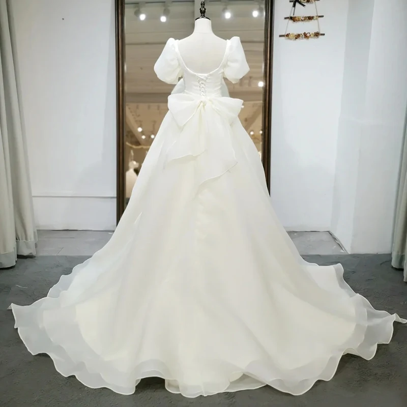 Korea Stijl Vierkante Hals A-lijn Puffy Mouwen Organza Backless Met Bow Kapel Train Lace-Up Trouwjurk Jurk Bridal jurk