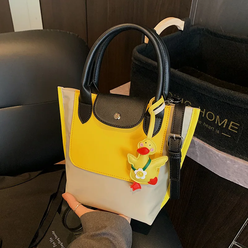 

Super Fire Niche! 2025 Women's Contrast Color Splicing - Exquisite Portable Bucket Messenger Bag