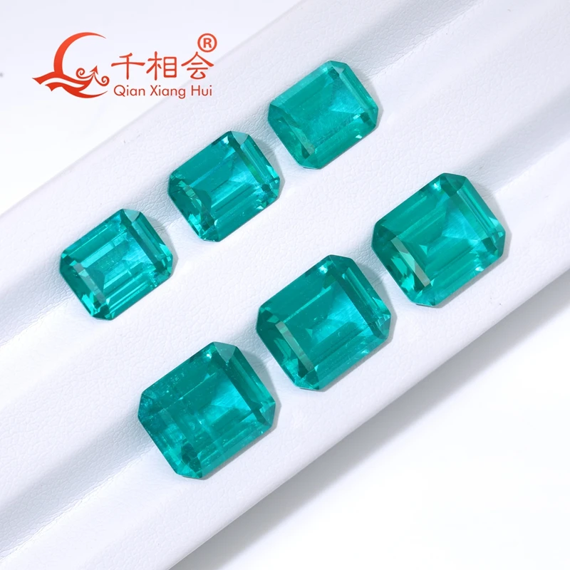Dark Paraiba with a neon glow lab grown  emerald shape Yttrium Aluminum Garnet with inclusions Neon-like gem stone jewelry YAG