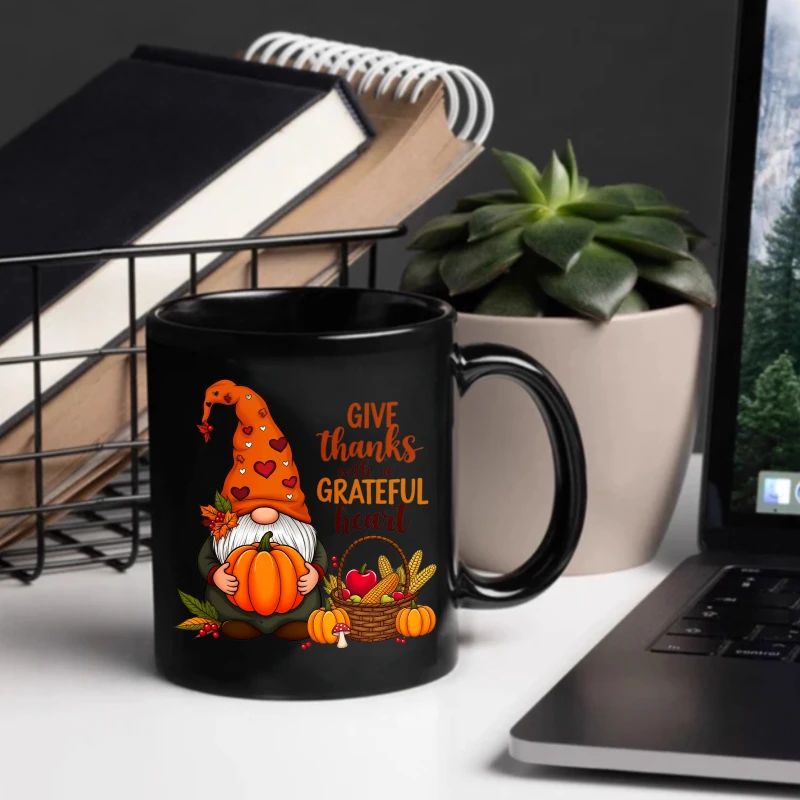 Black ceramic mug with elf, pumpkin and harvest elements, gratitude, Thanksgiving fall themed coffee teacup, suitable for autumn