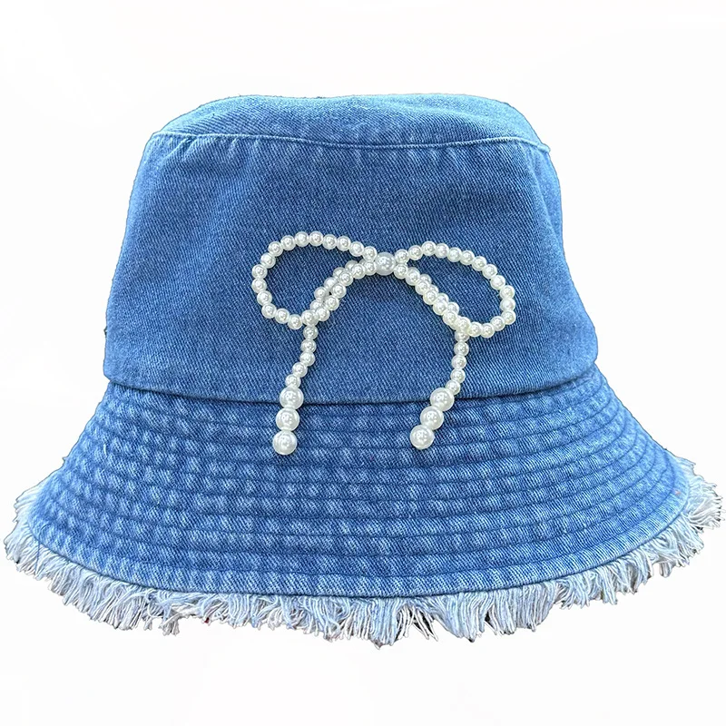 

South Korea's new sweet and cute pearl bow fisherman hat girl fashion foreign style fur edge washed to do old cowboy hat