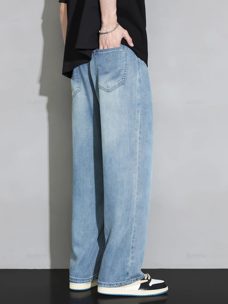 Letnie wysokiej jakości przytulne miękkie 100% Lyocell Jeans męskie spodnie dżinsowe z elastyczną talią Korea luźne, proste, niebieskie spodnie na