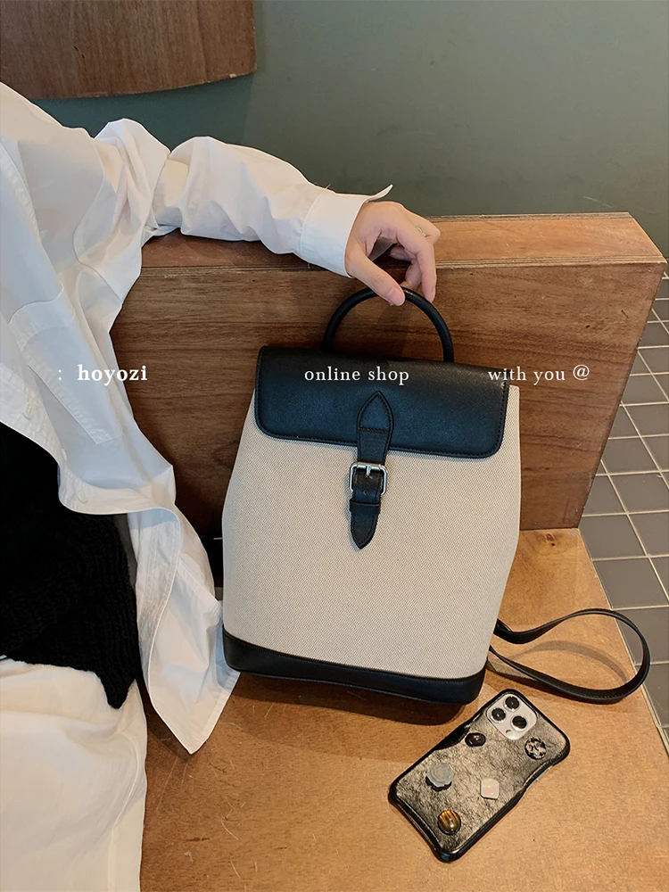 

Leather spliced canvas backpack women 2025 new shoulder
