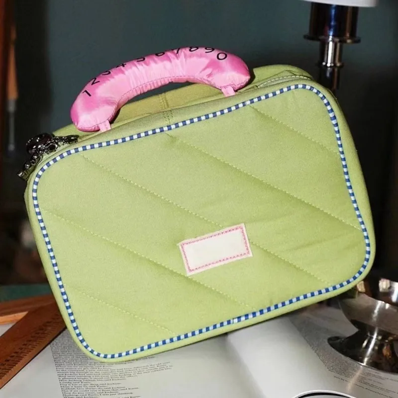 Borsa per il trucco da gita per studenti di stoccaggio carino di alta bellezza con griglia da donna borsa per il lavaggio del trucco portatile di