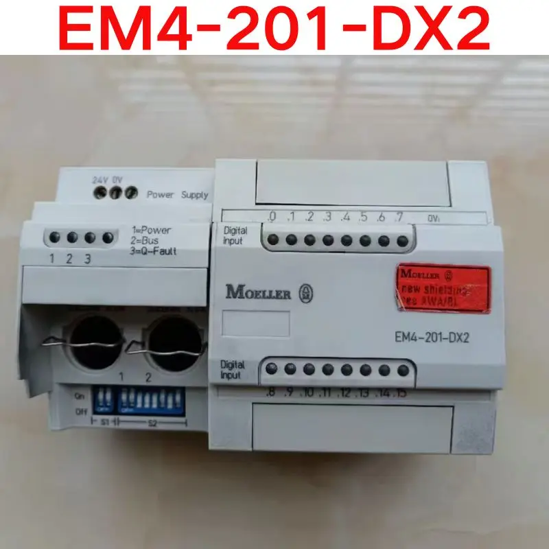 

Second-hand test OK. PLC module EM4-201-DX2