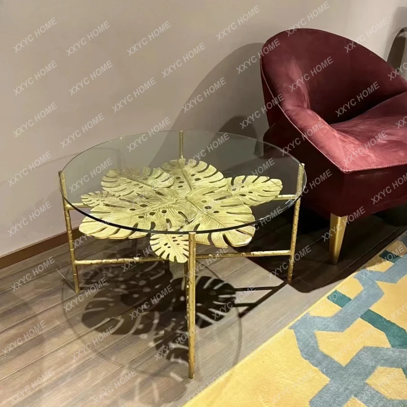 

Light luxury high-end glass coffee table living room home art fashion brass leaf edge table