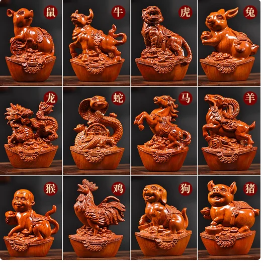 

Yellow pear wood carvings flowered of Chinese zodiac animals including rodents cows tigers rabbits dragons snakes horses sheep