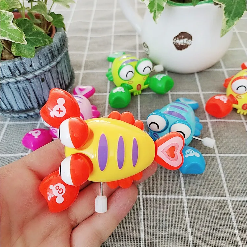 ของเล่นลานนาฬิกาใหม่การ์ตูนเด็กม้วนน่ารักสร้างสรรค์กุ้งมังกรสิ่งมีชีวิตในทะเล kado Bayi สัตว์ขนาดเล็ก