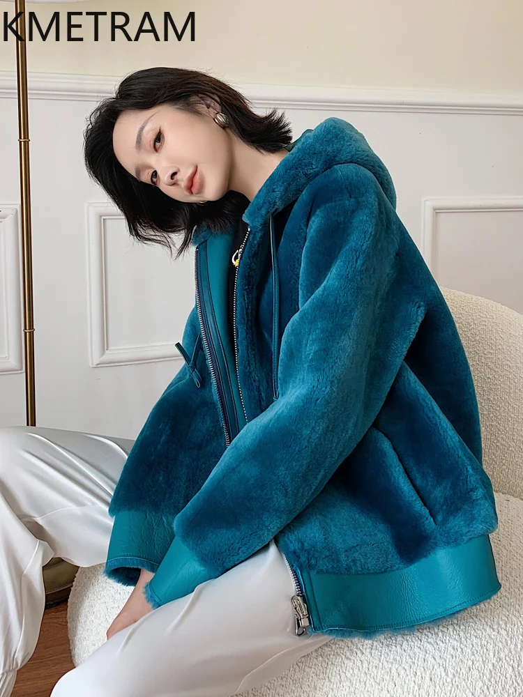 Jaket Bulu Berwajah Ganda Kulit Domba Wol Merino 100% Mantel Bulu Asli Dapat Dibalik Wanita dengan Tudung Pakaian Wanita Musim Dingin 2025 Fourrure