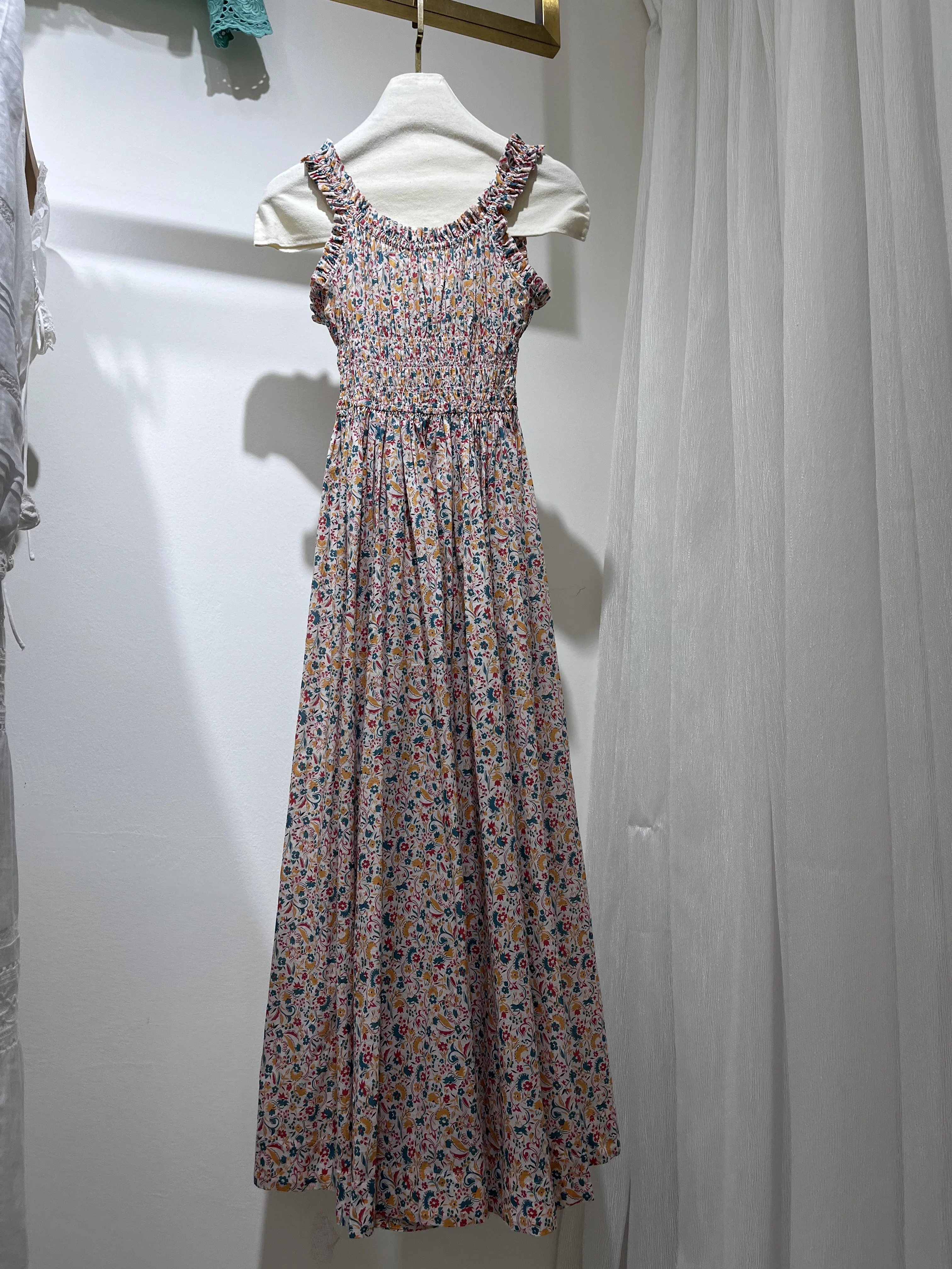 Abito lungo da donna in cotone con stampa floreale 2025 Nuovo abito da donna vintage senza maniche con elastico in vita smock