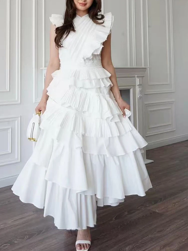 

Heavy solid color cross V-neck stitching wooden ear swing dress summer new temperament irregular cake dress