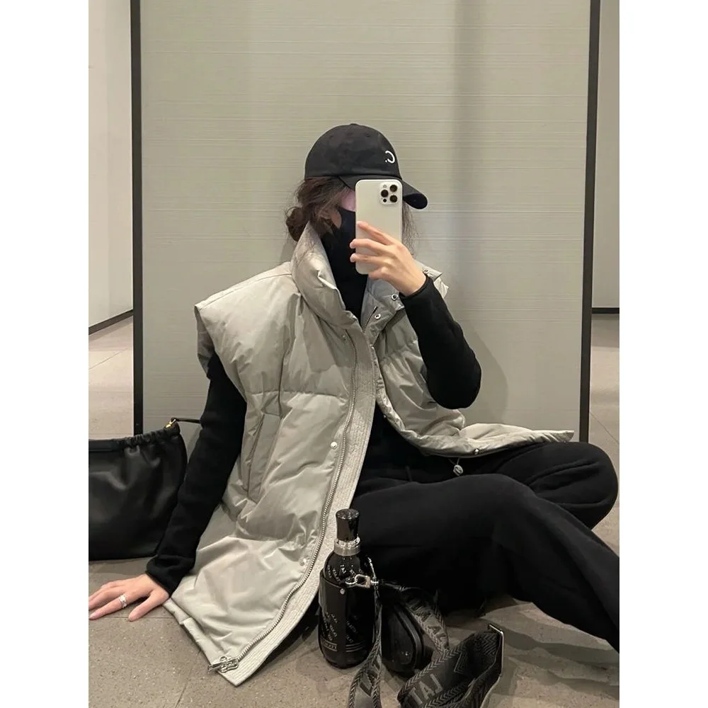 Chaleco de plumas a la moda para mujer, nuevo Otoño Invierno, grueso, holgado, de manga larga, Color puro, cierre de un solo botón