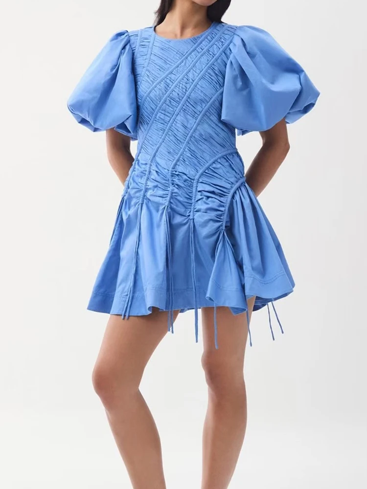 

In the summer of 2025, the new bubble sleeve pleated waist design is slim, and the short skirt is fashionable and round neck dre