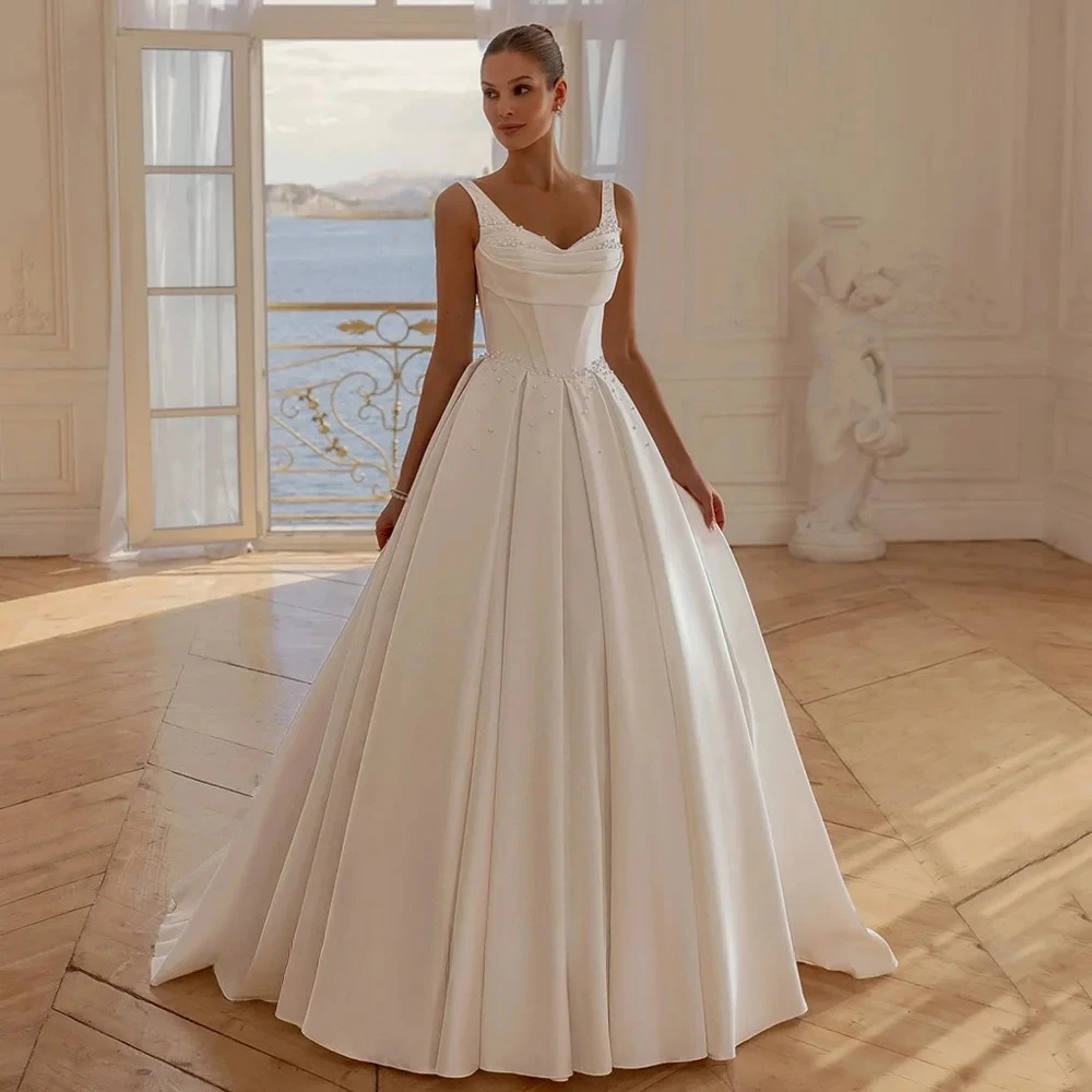 

Свадебное платье из атласа на заказ, с V-образным вырезом, без рукавов, с жемчугом, плиссированное, А-силуэт, со шлейфом, на корсете, свадебное платье-роба Mariee