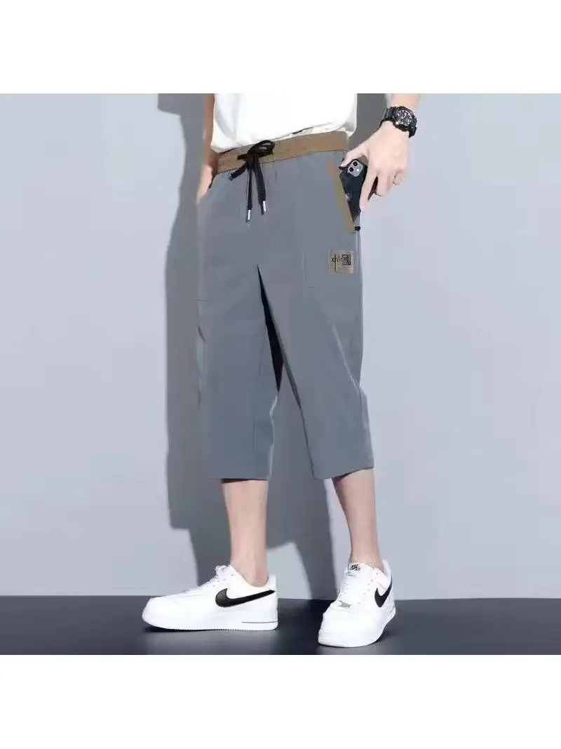 Pantaloni sportivi da uomo larghi in seta di ghiaccio Qui Dry con elastico in vita Gamba dritta Lunghezza sette piedi Sle giovanile e vitale