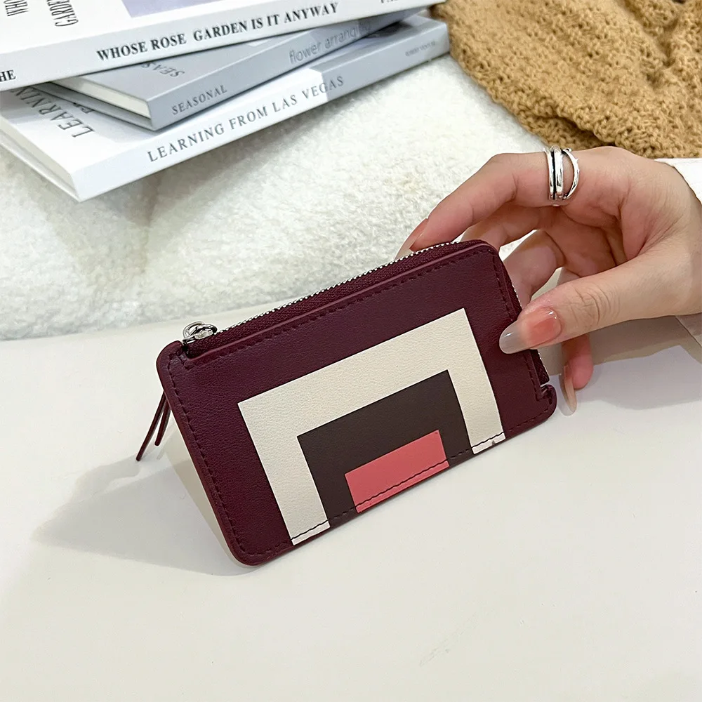 Leather Mini Wallet…