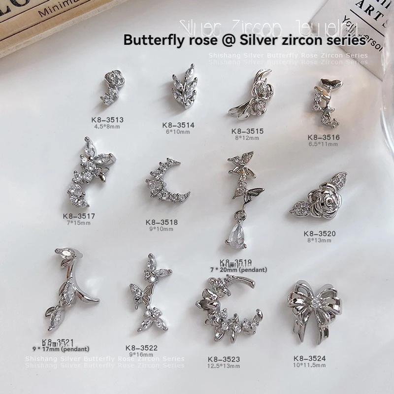 5PCS Nail Art Zircon Bowtie รูป 3D Charms โลหะเงินหรูหรา Rose ผีเสื้อโลหะอัญมณีสําหรับตกแต่งเล็บ