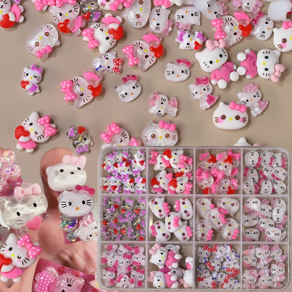 12 ตาราง/กล่อง 3D Sanrioed Kitty Nail Art Decor 10*8 มม.Bowknot Kitty เล็บ Charms แบนการ์ตูนสีชมพู/สีม่วง Kitty เล็บอะไหล่