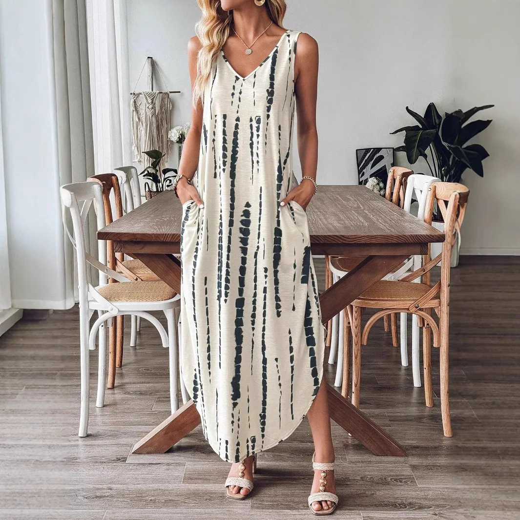 Modieuze vrijetijdsjurk Mouwloze zomerjurk met losse split en print V-hals Kleurblokken Print Mouwloze lange jurk voor dames
