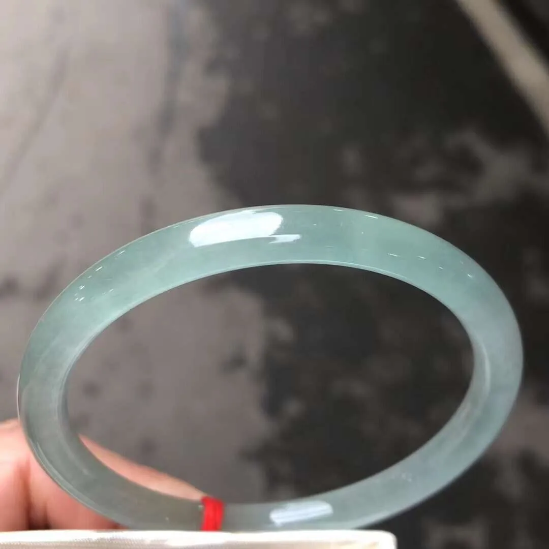 

Круглый браслет из натурального жадеита класса ААА, ледяного зеленого цвета, 54-64 мм, с сертификатом.