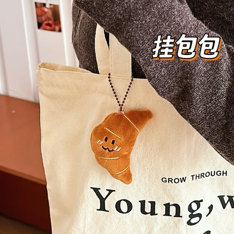 Pendentif de poupée en peluche de pain créatif, porte-clés polyvalent pour femmes et filles, poupées alimentaires simulées, pendentif de sac à dos, poupée décorative