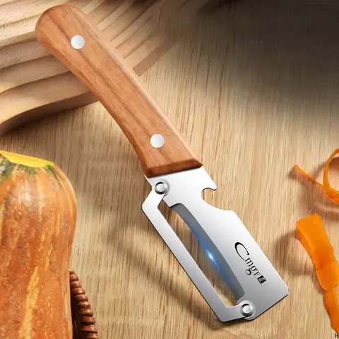 Stainless steel peeler with wooden handle for peeling and slicing fruits and vegetables | Durable and smooth operation