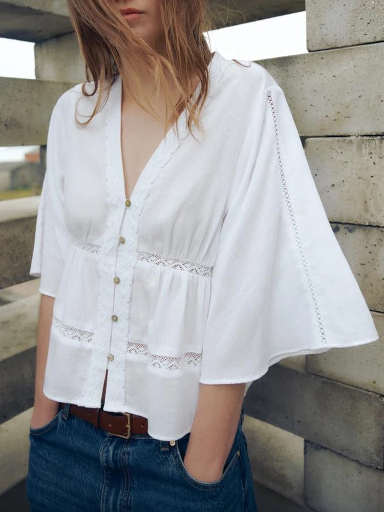 

European and American style summer new products women's clothing French solid color loose vertical lace V-neck shirt