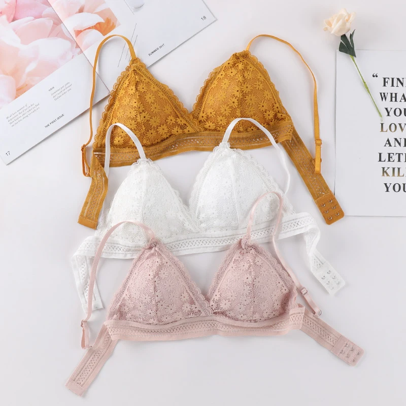 Sutiã de renda floral feminino sexy beleza roupa interior cor sólida bralette feminino sutiã sem fio sem costura sutiãs acolchoados oco para fora lingerie
